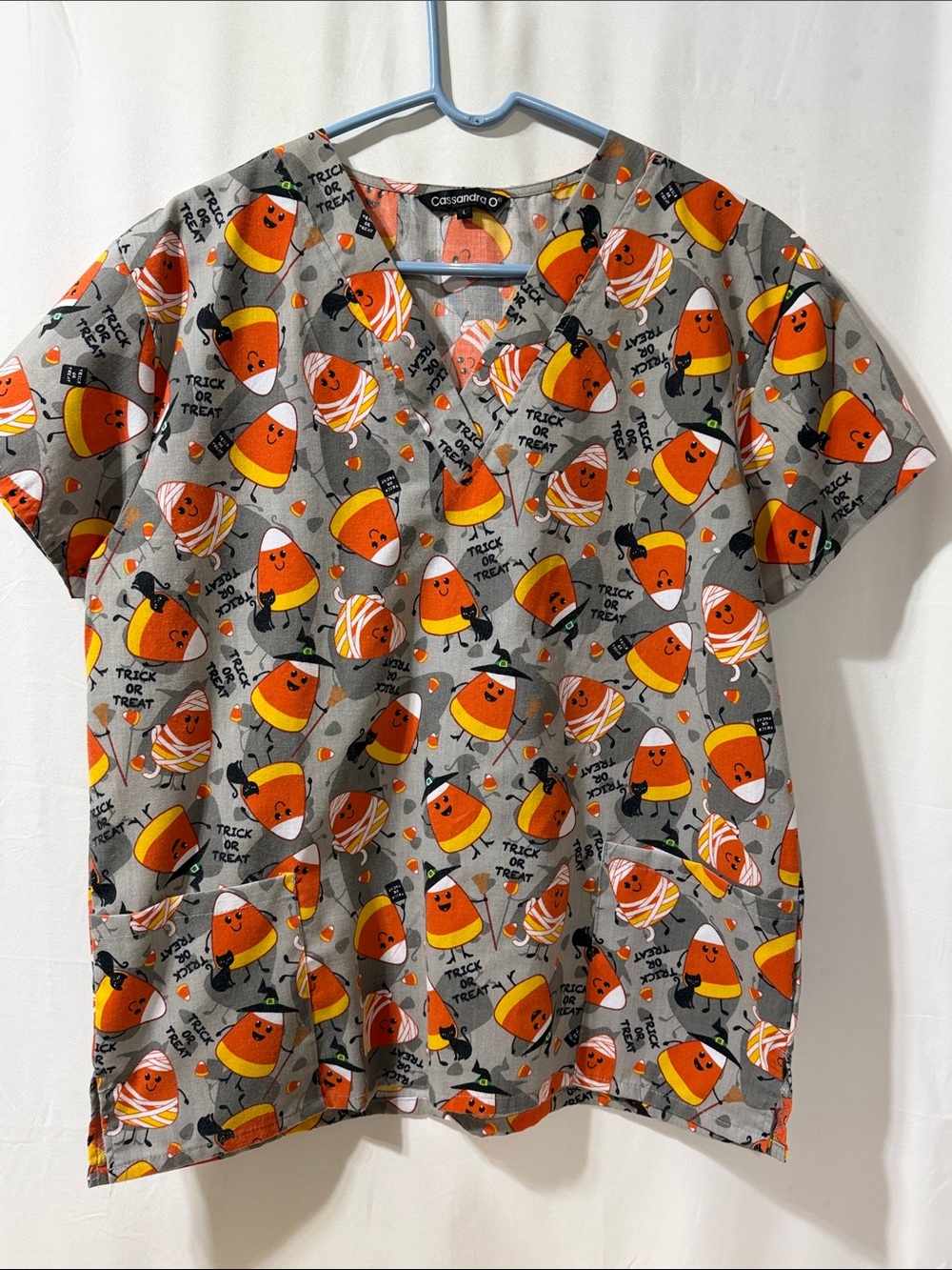 Cassandra Women’s Halloween Candy Corn Print Scrub - Gray/Orange